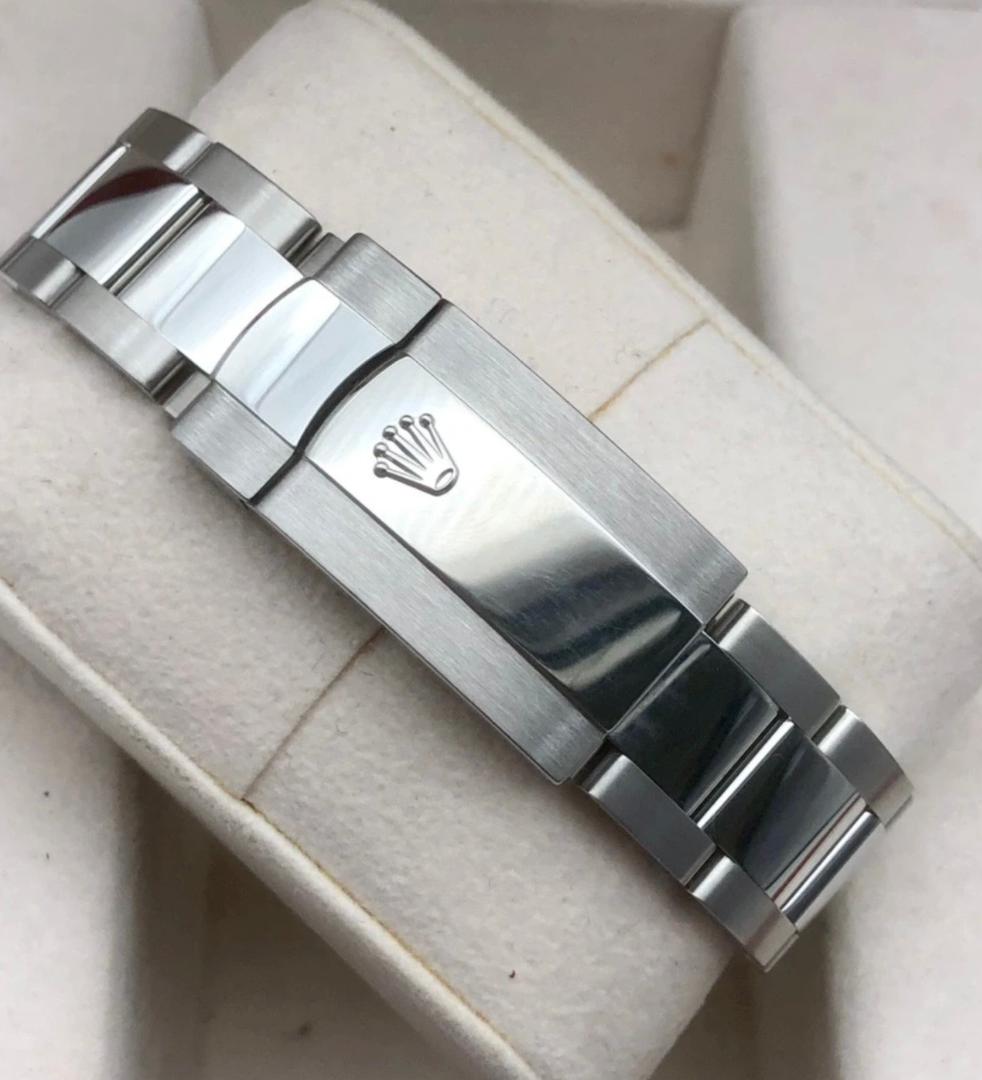 Rolex Datejust M126334-0009 , 41mm diameter, automatic, white dial, bar scale, classic bezel description